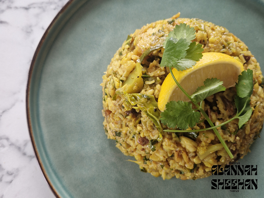 Spiced cauliflower rice with raisins and nuts
